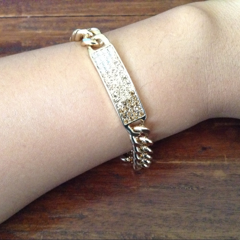 Gold chain bracelet with rhinestone accent